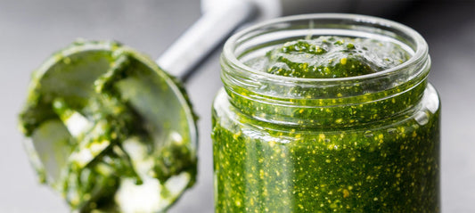 Fresh cooked Pesto basil sauce in a jar