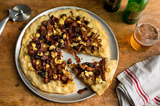 Pizza and beer on a table